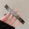 Pinza para el pelo de estampado a cuadros para mujer, nuevo modelo 2026, pinza ovalada hueca para la parte trasera de la cabeza, pinza de pico de pato grande, accesorio para el cabello de alta gama