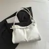 Bolso de hombro PU de alta calidad de nueva temporada transfronterizo, elegante y de nicho, estilo coreano, bolso de hombro plisado versátil y moderno para mujer