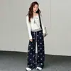 Calça Casual Feminina Estilo Coreano com Estampa de Estrelas Retrô, Blocos de Cor, Cintura Elástica, Modelo Solto, Caimento Fluido, Perna Larga, Calça de Moletom Tricotada