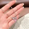 Collar con borla en forma de corazón y lazo estilo Xiaohongshu para mujer, lujo ligero, moderno, exquisito, diseño dulce, cadena versátil para la clavícula