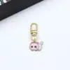 Colgante de gatito de aleación estilo japonés Llavero de coche mini Colgante para AirPods Accesorio para bolso pequeño Regalo
