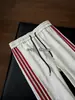 Pantalones de retazos a rayas retro americanos de secado rápido para hombre, pantalones deportivos finos de seda helada de verano, pantalones largos casuales para entrenamiento físico