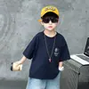Conjunto de Verano para Niños 2026 Nuevo de Moda Camiseta de Manga Corta y Shorts de Mezclilla Conjunto de Dos Piezas Estilo Coreano Ropa de Moda