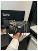 Nova moda bolsa de ombro transversal com corrente para noite para mulheres com bordado transfronteiriço e padrão de diamante