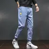 Jeans novo masculino 2023 calças jovens tendência coreana calças casuais de perna larga geração de cabelo