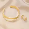 Pulsera Anillo de Mobius Cruzada Nueva Europea y Americana para Mujer Línea Irregular Anillo de Aleación Cruzada Pulsera conjunto