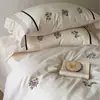 Conjunto de quatro peças em algodão e linho tingido estilo francês com capa de edredom bordada, lençol de cima e lençol com elástico para cama de 1,5m 1,8m Roupa de cama fresca e elegante