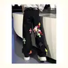 Outono de 2025 Novo Jeans Colorido Patchwork de Couro Calça Longa Reta Solta Estilo Preguiçoso Maduro de Perna Larga para Homens