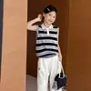 Conjunto Polo para Meninas Roupa de Verão 2026 Novo Estilo Crianças Maiores Colete de Tricô Listrado Calça Cargo Floral Conjunto de Duas Peças Tendência