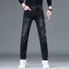 Pantalones vaqueros negros de alta gama para hombre, forrados de forro polar para otoño e invierno, estilo europeo, bordados, corte ajustado, pitillo, elásticos, versátiles, casuales, modernos