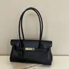 Bolsa de ombro estilo vintage, de alta qualidade, versátil, formato baguette, para mulheres, nova coleção 2026, simples e chique para o dia a dia, bolsa tote de ombro