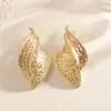 Pendientes de Aleación con Forma de Espiral y Diseño de Textura Tridimensional, Lujo Ligero, Elegantes, Versátiles, Modernos y Llamativos, Fabricante de Pendientes