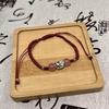 Nuevo Pulsera de Cerámica Estilo Chino con Cascabel de Mariposa Cuerda Roja para Mujer Estilo Tibetano Retro Algodón Frotado Espina de Mano Tejido a Mano Cuerda de Mano Joyería