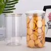 Envases transparentes de plástico PET de fácil apertura, recipientes sellados de grado alimenticio para frutos secos, snacks, bayas de goji y productos secos, disponibles en varios tamaños y personalizables