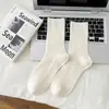 Nuevos Calcetines de Lana de Negocios para Hombre Otoño e Invierno 2025 Versátiles de Color Puro Calcetines de Canalé Doble de Media Pantorrilla Calcetines para Hombre con Rayas Verticales