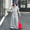 Traje Deportivo de Verano para Niñas 2025 Nuevo Conjunto de Moda de Dos Piezas para Niños Grandes con Top de Manga Corta y Pantalones de Pierna Ancha