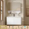 Tocador de baño engrosado y ahorrador de espacio con diseño en color crema, que cuenta con un lavabo redondeado, lavabo cerámico integrado y un lavabo de una sola pieza.