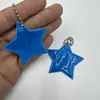 36 Colores Colgante Reflectante PVC Estrella de Cinco Puntas Llavero con Logo Personalizable Colgante Nocturno Accesorios para Mochila Escolar X