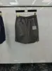 Directo de fábrica TB tendencia de verano hombres y mujeres con cuatro barras rayas reflectantes secado rápido pantalones de playa a prueba de viento protección solar