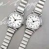 Reloj de Mujer Estilo Nuevo con Acabado de Alta Gama, Venta al por Mayor Transfronteriza Reloj de Mujer de Cuarzo Simple con Esfera Pequeña, Correa de Acero y Diseño de Eslabones de Bambú