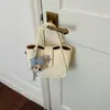 Bolso tipo cubo retro de moda estilo coreano transfronterizo para mujer, nuevo modelo de verano 2026, bolso de hombro de alta apariencia, bolso de mano y bolso cruzado