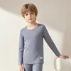 Conjunto de ropa interior térmica para niños, capa base sin costuras forrada de forro polar de grado A para niñas, ropa de otoño antibacteriana 7A para niños (arriba y abajo)