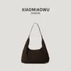 Bolsa hobo leve de nylon estilo coreano, um design transfronteiriço novo e moderno, simples e casual, versátil, adequada para estudantes, e pode ser carregada na mão ou usada como bolsa de ombro para o dia a dia.