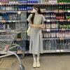 Nuevo vestido sencillo estilo Hong Kong con abertura para mujer, elegante diseño de nicho de verano, con sensación adelgazante, vestido largo cruzado.