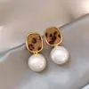Linda atmosfera anfitriã ~ explosão leopardo estampa trevo de quatro folhas brincos de metal pele de crina de cavalo de alta qualidade brincos de vento doce e fresco