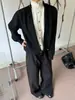 2026 Estilo Coreano Falso Dos Piezas Tejido Unisex Botón Capa Mezcla de Lana Juvenil Soleado Moderno de Moda