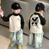 Camiseta Térmica de Polar para Niños Cuello Semi Alto Capa Base 2026 Otoño/Invierno Nuevo Bloque de Color Camiseta para Niños Moderna Versátil Top Moderno