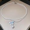 Collar de perlas de doble capa con mariposa de cristal azul apilado, collar elegante y de moda para mujer, cadena de clavícula ligera y de lujo de alta gama.