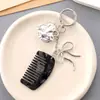 Peine Mini Llavero Colgante de Ácido Acético de Moda Simple Sentido Avanzado Forma Especial Amor Equipaje Teléfono Móvil Colgante Regalos