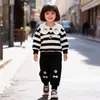 Ropa Infantil Conjunto de Otoño para Niñas Nuevo Elegante Conjunto de Dos Piezas de Manga Larga a Rayas para Bebés Temporada de Primavera y Otoño Venta al por Mayor