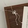 Collar extraíble con colgante de lazo para mujer, cadena decorativa larga estilo coreano para suéter, accesorio versátil de plata para camiseta