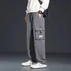 Pantalones Cargo Negros de Talla Grande para Hombre Estilo Nuevo Primavera y Otoño 2024 Holgados Rectos Multibolsillo Casuales Largos para Hombre
