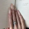 Z-321 Uñas Postizas Flor Pequeña Cristal Nude Punta Larga Transfronteriza Chica Caliente Flor de Cristal Gama Alta 24 Piezas Puntas de Uñas Portátiles Venta al por Mayor