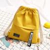 Bolsa de Lona para Niñas Mochila con Cordón Color Sólido Simple 2021 Bolsa de Tela Bolsillo con Solapa y Cordón Pantalones Estilo Coreano Bolsa para Mujer Mochila con Cordón