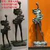 Lámpara de escultura abstracta de bola de personaje Lámpara de sala de exposiciones lámpara de oficina de ventas de hotel Lámpara de decoración artística lámpara de león lámpara de pie con forma humana