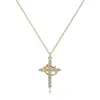 Collar Cruz Popular Transfronterizo Corona Cruzada para Mujer Cobre No Descolorante Chapado en Oro Moda Lujo Ligero Collar de Corona Giratorio