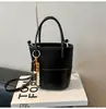Moda de Comercio Exterior Retro Bolso Pequeño para Mujer 2026 Nuevo Invierno Versátil Bolso Cruzado de Hombro de Gama Alta Tipo Cubo de Moda