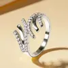 Design de nicho sensação de moda versátil estilo de deslocamento anel de diamante sensação de alta qualidade anel personalizado AliExpress transmissão ao vivo transfronteiriça atacado