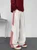 Pantalones de estilo americano con patrón de escamas de dragón en bloques de color para hombre, pantalones deportivos casuales de pierna recta para otoño, pantalones holgados de pierna ancha, modernos y elegantes