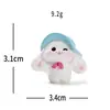 Micro-paisaje creativo lindo brisa de primavera conejito blanco figura decoración DIY accesorio de caja sorpresa adorno de escritorio