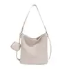 Bolsa de Grande Capacidade Feminina 2026 Nova Moda Outono Bolsa Transversal Tecida Toque de Luxo Super Quente Bolsa de Ombro Único Tipo Saco