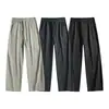 Pantalones casuales para hombre resistentes a las arrugas y fáciles de cuidar con cintura de cordón, colección otoño 2026, con un diseño deconstruido y un corte recto holgado estilo workwear