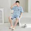Pijama de Algodão Puro Estilo Novo 2026 para Homens, Estilo Cartoon Solto, Juvenil, Pode Ser Usado Fora, Sem Mangas Manga Curta Shorts, Conjunto para Casa