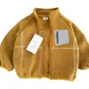 Chaqueta Lisa Infantil 2026 Otoño/Invierno Nuevo Estilo para Niños y Niñas Niños Pequeños y Medianos Cremallera Cuello Alto Tendencia Top Cárdigan de Bebé Elegante