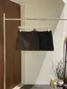 [Kaipu] Pantalón falda metálico de cuero con cremallera lateral estilo francés de trece líneas Otoño, versátil, de alta gama, casual, falda midi BQA5200
