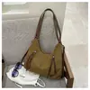 Bolsa tote simples para mulheres, nova coleção primavera 2026, grande capacidade, moderna e versátil, pode ser usada como bolsa de mão ou mochila